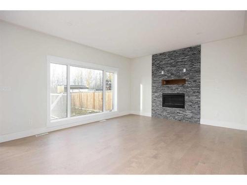 189 Warren Way, Fort Mcmurray, AB - Indoor Photo Showing Living Room With Fireplace