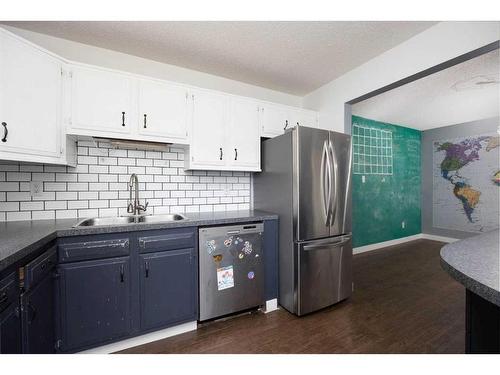 182 Wolverine Drive, Fort Mcmurray, AB - Indoor Photo Showing Kitchen With Double Sink