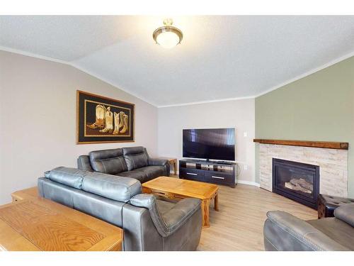 304 Ash Way, Fort Mcmurray, AB - Indoor Photo Showing Living Room With Fireplace