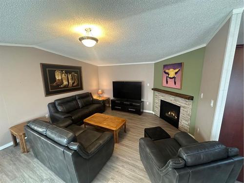 304 Ash Way, Fort Mcmurray, AB - Indoor Photo Showing Living Room With Fireplace