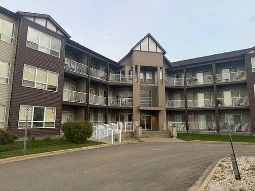 207-290 Plamondon Drive, Fort Mcmurray, AB - Outdoor With Balcony With Facade