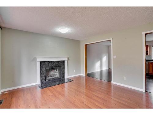 339 Cornwall Drive, Fort Mcmurray, AB - Indoor Photo Showing Living Room With Fireplace