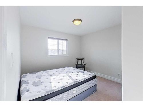 212 Paulson Street, Fort Mcmurray, AB - Indoor Photo Showing Bedroom