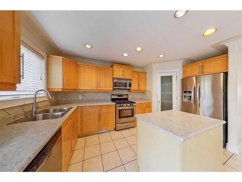 212 Paulson Street, Fort Mcmurray, AB - Indoor Photo Showing Kitchen With Stainless Steel Kitchen With Double Sink