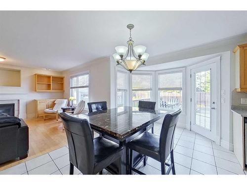 212 Paulson Street, Fort Mcmurray, AB - Indoor Photo Showing Dining Room With Fireplace