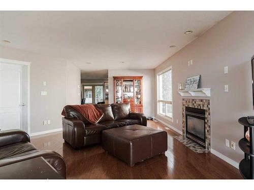 136 Pinnacle Place, Fort Mcmurray, AB - Indoor Photo Showing Living Room With Fireplace