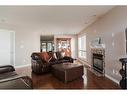 136 Pinnacle Place, Fort Mcmurray, AB  - Indoor Photo Showing Living Room With Fireplace 