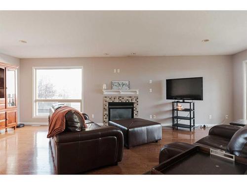 136 Pinnacle Place, Fort Mcmurray, AB - Indoor Photo Showing Living Room With Fireplace