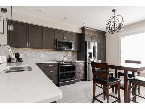 105 Roy Lane, Fort Mcmurray, AB - Indoor Photo Showing Kitchen With Stainless Steel Kitchen With Double Sink