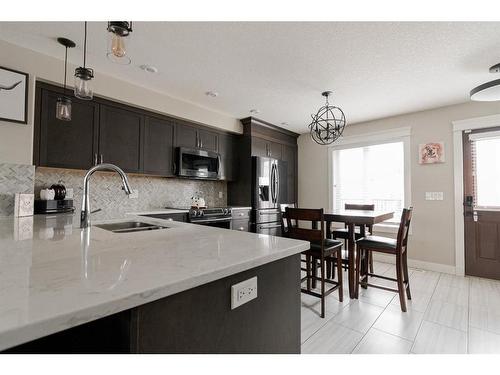 105 Roy Lane, Fort Mcmurray, AB - Indoor Photo Showing Kitchen With Double Sink With Upgraded Kitchen