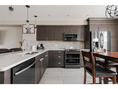 105 Roy Lane, Fort Mcmurray, AB - Indoor Photo Showing Kitchen With Stainless Steel Kitchen With Double Sink With Upgraded Kitchen