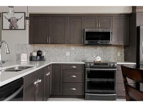 105 Roy Lane, Fort Mcmurray, AB - Indoor Photo Showing Kitchen With Double Sink With Upgraded Kitchen