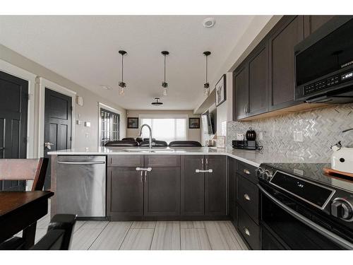 105 Roy Lane, Fort Mcmurray, AB - Indoor Photo Showing Kitchen With Upgraded Kitchen