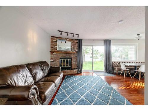 124 Marten Place, Fort Mcmurray, AB - Indoor Photo Showing Living Room With Fireplace