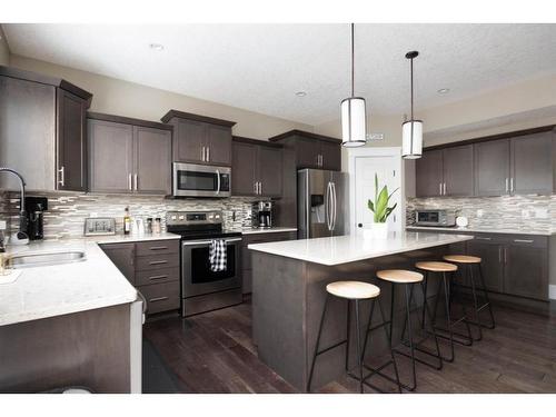 213 Dafoe Way, Fort Mcmurray, AB - Indoor Photo Showing Kitchen With Stainless Steel Kitchen With Upgraded Kitchen