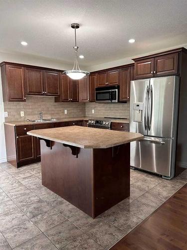 22-193 O'Coffey Crescent, Fort Mcmurray, AB - Indoor Photo Showing Kitchen With Stainless Steel Kitchen With Double Sink