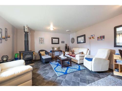 141 Caldwell Crescent, Fort Mcmurray, AB - Indoor Photo Showing Living Room With Fireplace