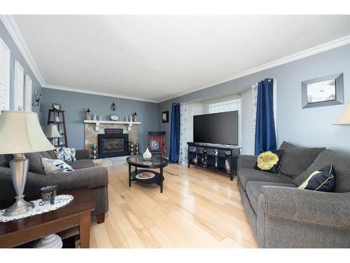 141 Caldwell Crescent, Fort Mcmurray, AB - Indoor Photo Showing Living Room With Fireplace