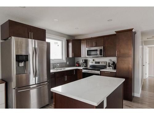 205 Leigh Crescent, Fort Mcmurray, AB - Indoor Photo Showing Kitchen With Stainless Steel Kitchen