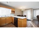 117 Sandulac Street, Fort Mcmurray, AB  - Indoor Photo Showing Kitchen With Double Sink 