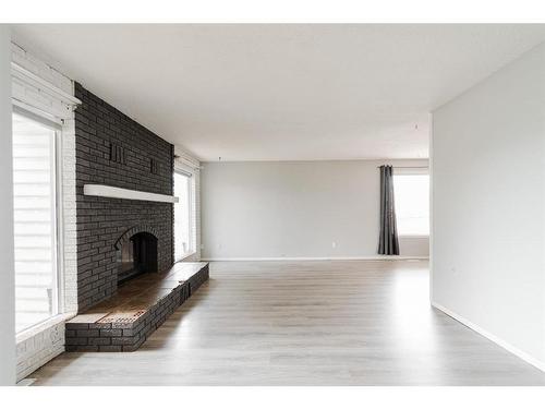 163 Cornwall Drive, Fort Mcmurray, AB - Indoor Photo Showing Living Room With Fireplace