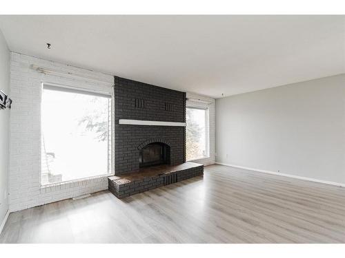 163 Cornwall Drive, Fort Mcmurray, AB - Indoor Photo Showing Living Room With Fireplace