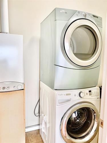 410-10212 101 Street, Lac La Biche, AB - Indoor Photo Showing Laundry Room