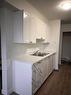 5-11 Clearwater Crescent, Fort Mcmurray, AB  - Indoor Photo Showing Kitchen With Double Sink 