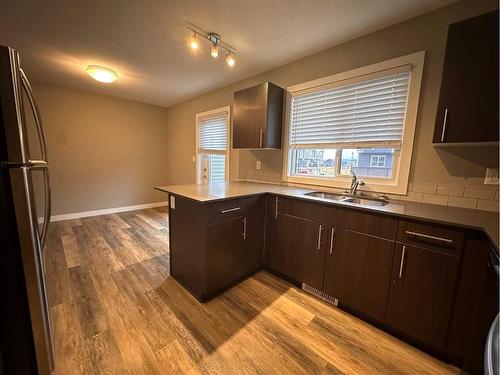 42-401 Athabasca Avenue, Fort Mcmurray, AB - Indoor Photo Showing Kitchen With Double Sink