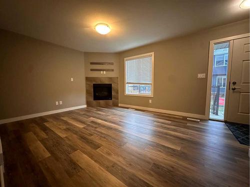 42-401 Athabasca Avenue, Fort Mcmurray, AB - Indoor Photo Showing Living Room With Fireplace