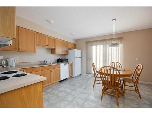 305-123 Arabian Drive, Fort Mcmurray, AB - Indoor Photo Showing Kitchen With Double Sink