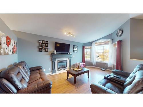 337 Diefenbaker Drive, Fort Mcmurray, AB - Indoor Photo Showing Living Room With Fireplace