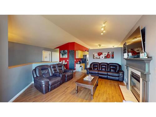 337 Diefenbaker Drive, Fort Mcmurray, AB - Indoor Photo Showing Living Room With Fireplace