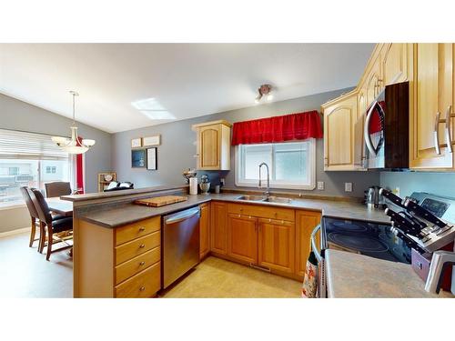 337 Diefenbaker Drive, Fort Mcmurray, AB - Indoor Photo Showing Kitchen With Double Sink