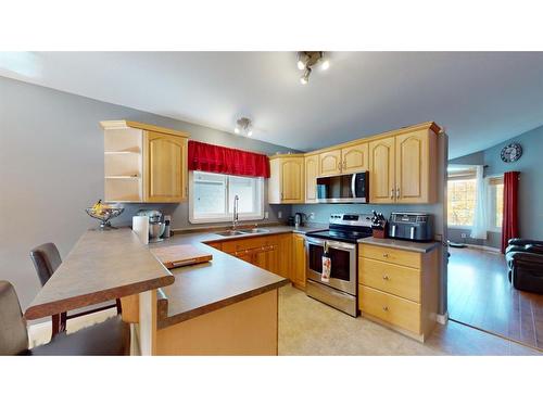 337 Diefenbaker Drive, Fort Mcmurray, AB - Indoor Photo Showing Kitchen With Double Sink