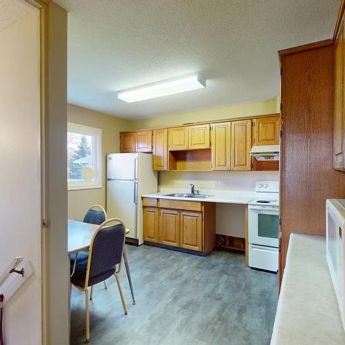 20 Fitzgerald Avenue, Fort Mcmurray, AB - Indoor Photo Showing Kitchen With Double Sink