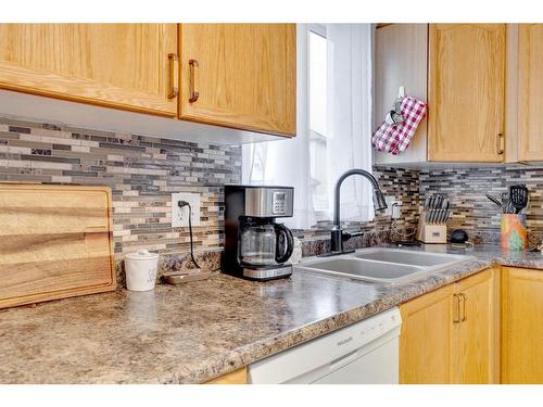 197 Kodiak Crescent, Fort Mcmurray, AB - Indoor Photo Showing Kitchen With Double Sink