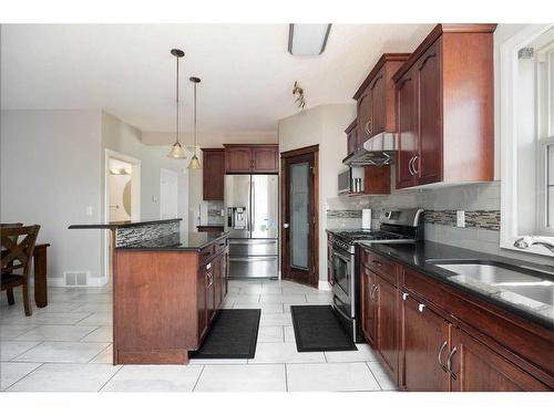 174 Grouse Way, Fort Mcmurray, AB - Indoor Photo Showing Kitchen With Double Sink