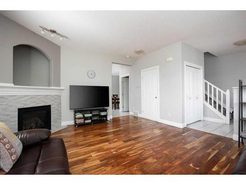 174 Grouse Way, Fort Mcmurray, AB - Indoor Photo Showing Living Room With Fireplace