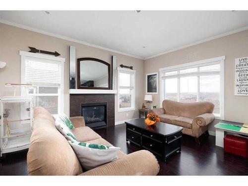 224 Beaverlodge Close, Fort Mcmurray, AB - Indoor Photo Showing Living Room With Fireplace