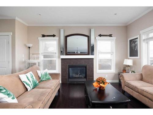 224 Beaverlodge Close, Fort Mcmurray, AB - Indoor Photo Showing Living Room With Fireplace