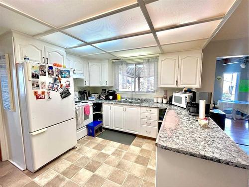 32 Lakeview Crescent, Lac La Biche, AB - Indoor Photo Showing Kitchen With Double Sink