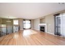 130 Paris Bay, Fort Mcmurray, AB  - Indoor Photo Showing Living Room With Fireplace 