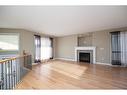 130 Paris Bay, Fort Mcmurray, AB  - Indoor Photo Showing Living Room With Fireplace 