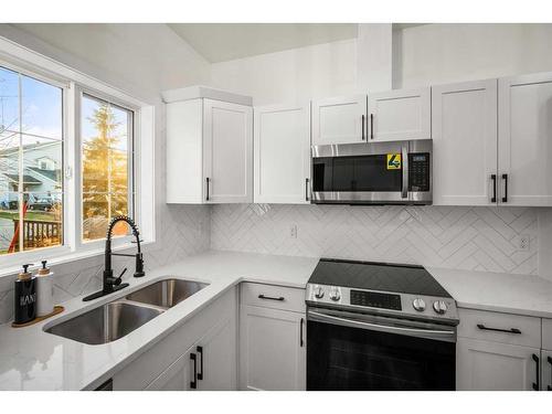 4103-200 Lougheed Drive, Fort Mcmurray, AB - Indoor Photo Showing Kitchen With Double Sink