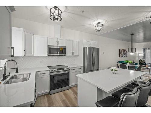 4103-200 Lougheed Drive, Fort Mcmurray, AB - Indoor Photo Showing Kitchen With Double Sink With Upgraded Kitchen