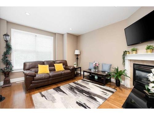 107 Sandpiper Road, Fort Mcmurray, AB - Indoor Photo Showing Living Room With Fireplace