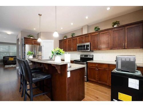 107 Sandpiper Road, Fort Mcmurray, AB - Indoor Photo Showing Kitchen With Stainless Steel Kitchen