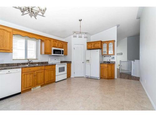 134 Lanauze Street, Fort Mcmurray, AB - Indoor Photo Showing Kitchen With Double Sink