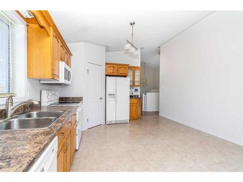 134 Lanauze Street, Fort Mcmurray, AB - Indoor Photo Showing Kitchen With Double Sink